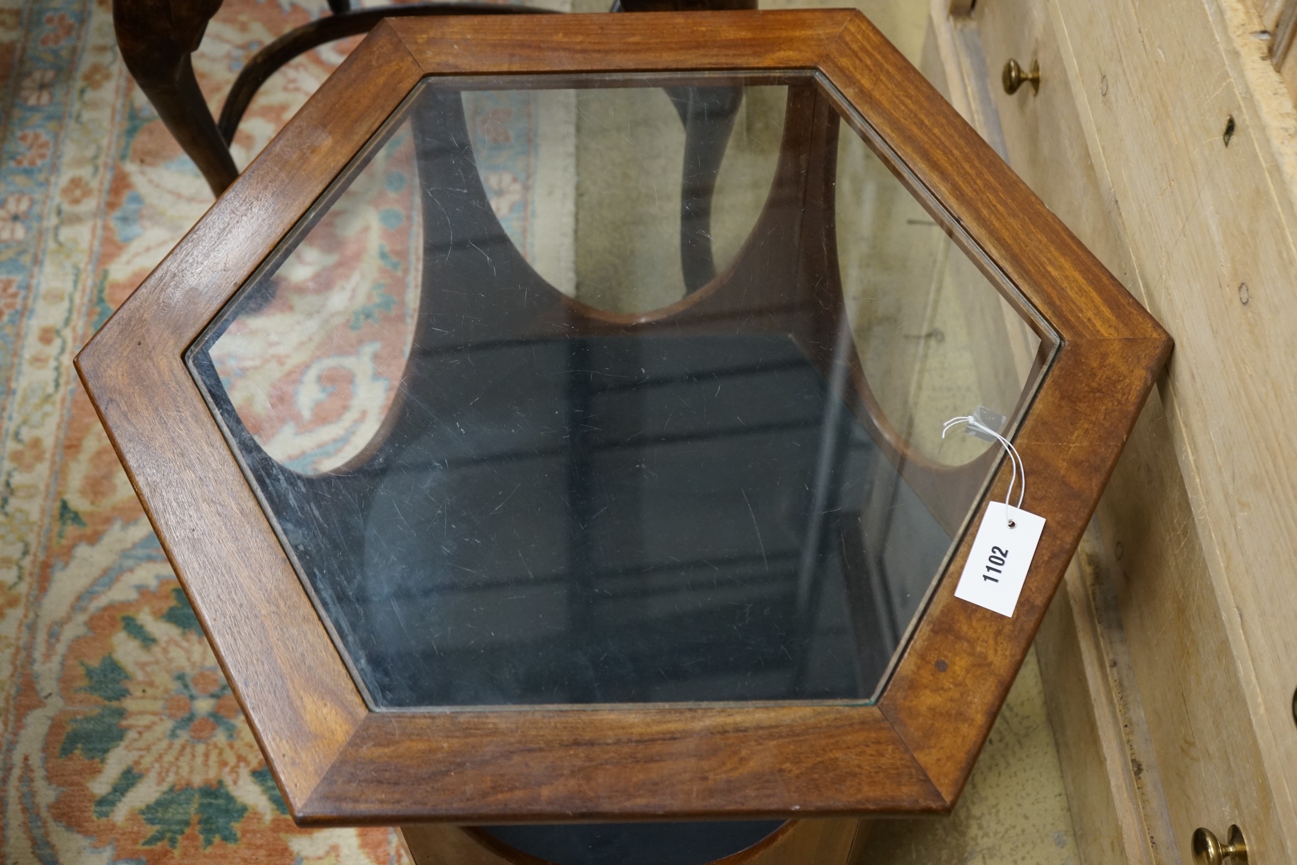 A mid century design hexagonal teak brass top coffee table, width 63cm, height 42cm